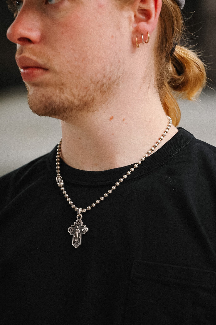 Man wearing black t-shirt on blurred background