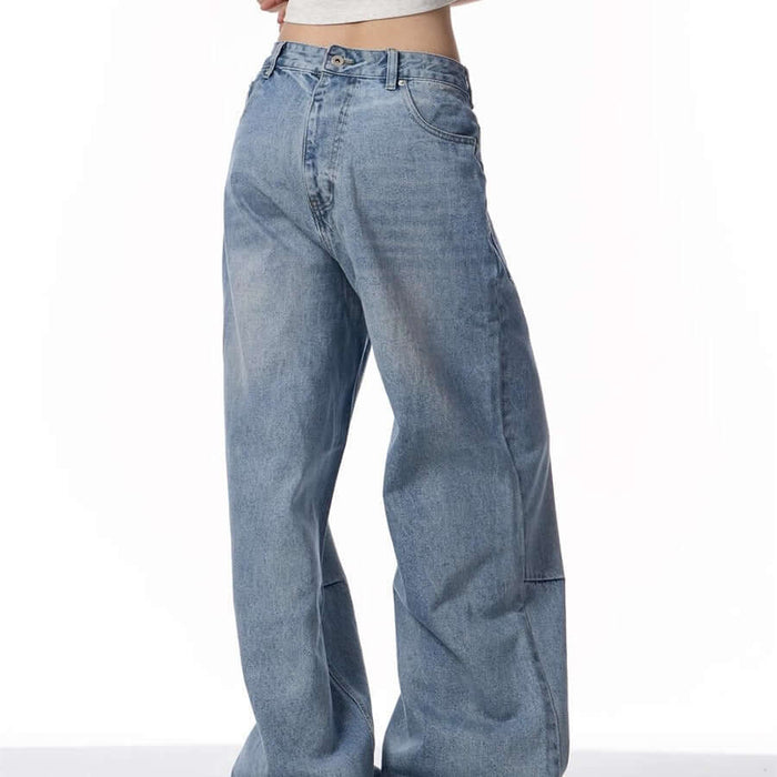 Retro Reverse-wear Washed Denim Jeans for Men showing a slim fit in light blue color.