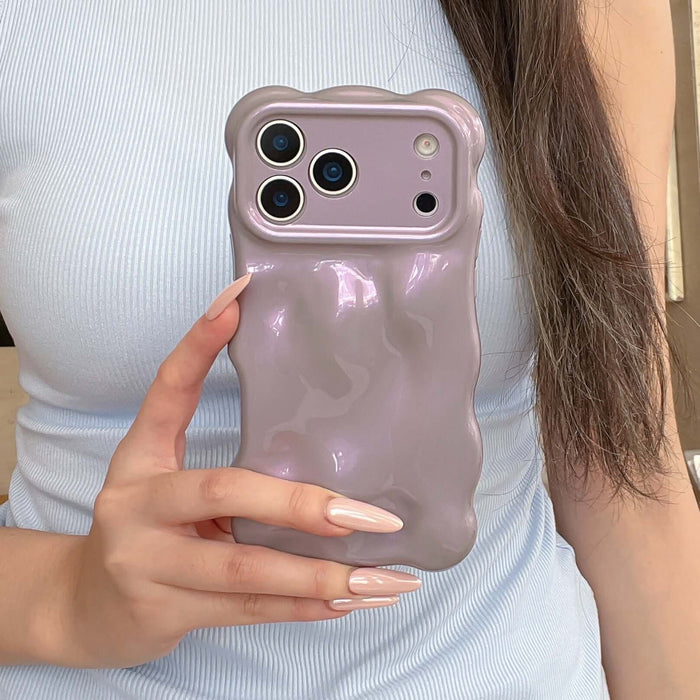 Simple Bubble Wave Pearl Drop-Proof Phone Case Cover held in hand, showcasing its unique design and protective features.