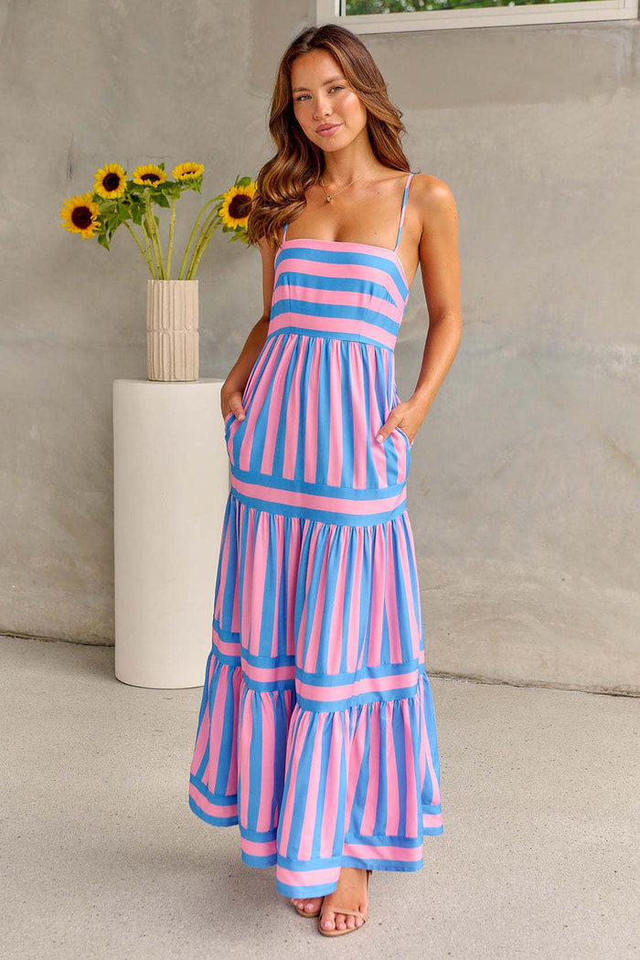 Summer Striped Suspender Long Beach Dress with Pockets displayed on model with sunflowers in background.
