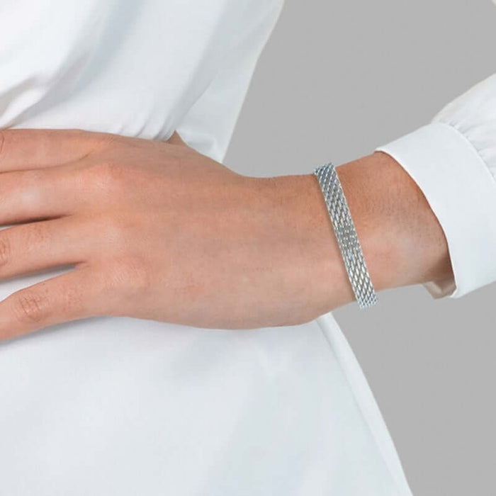 Women Chain Bracelet Golden Silver Metal Jewelry worn on wrist with elegant white blouse, showcasing its stylish design.