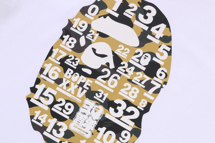 A BATHING APE 32ND ANNIV. 1ST CAMO BIG APE HEAD TEE