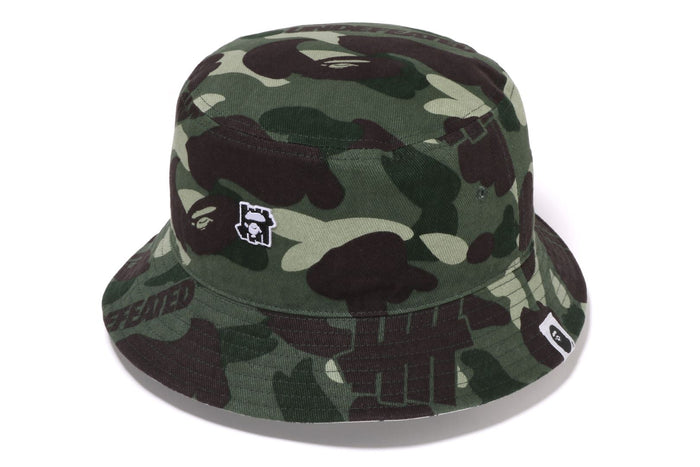 BAPEÂ® X UNDEFEATED COLOR CAMO FLANNEL BUCKET HAT