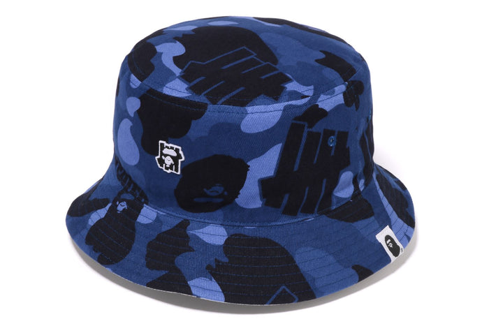 BAPEÂ® X UNDEFEATED COLOR CAMO FLANNEL BUCKET HAT