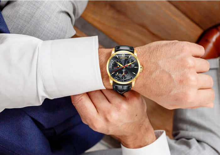 Carnival Full Automatic Mechanical Mens Watch worn by a man in a formal outfit, showcasing style and elegance.