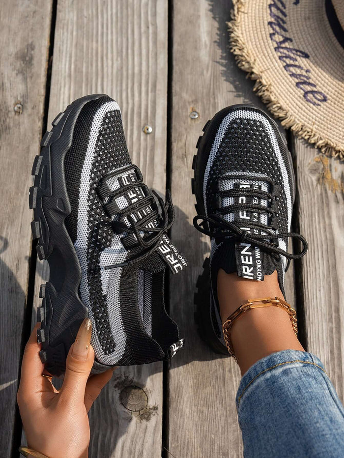Comfortable Womens Flyknit Sneakers Breathable Walking Shoes model wearing sneakers for gym