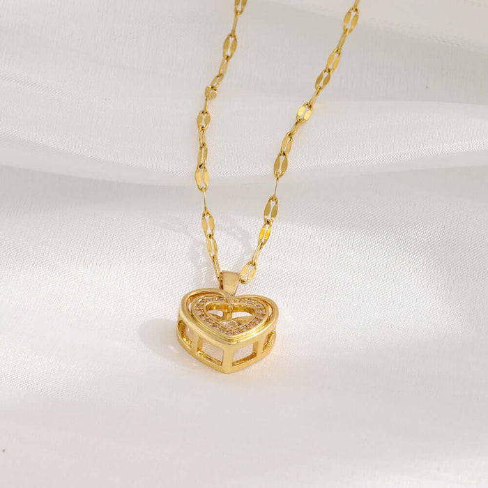 Double-layer Love Necklace With Rhinestones Pendant, featuring a gold heart pendant on a delicate chain.