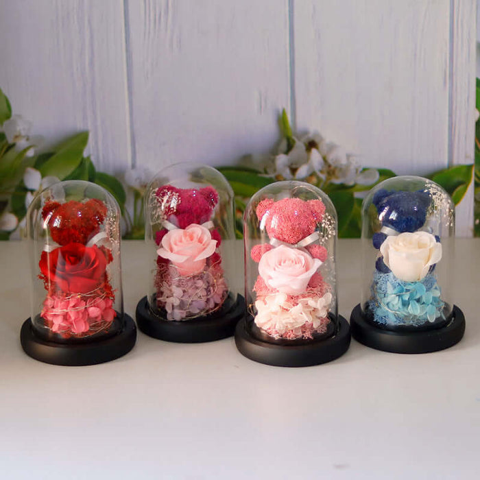 Eternal Rose Bear in Glass Dome glowing in the dark with LED lights.