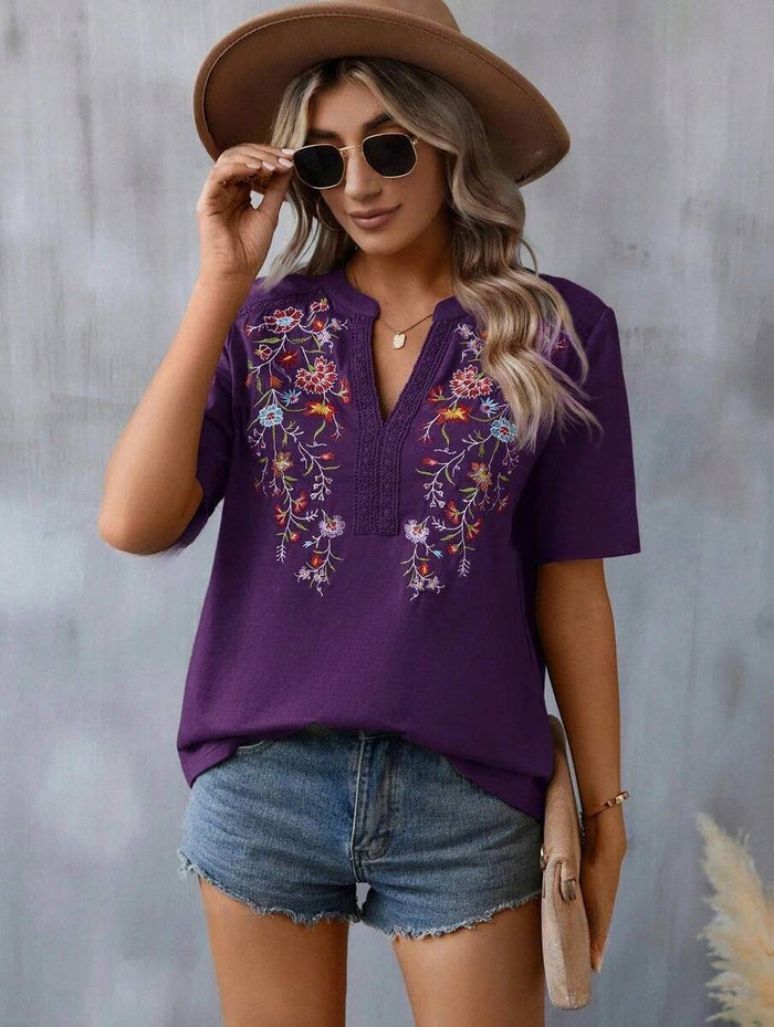 Fashion Flowers Embroidery Lace-collared Blouse displayed on a model wearing sunglasses and a hat.
