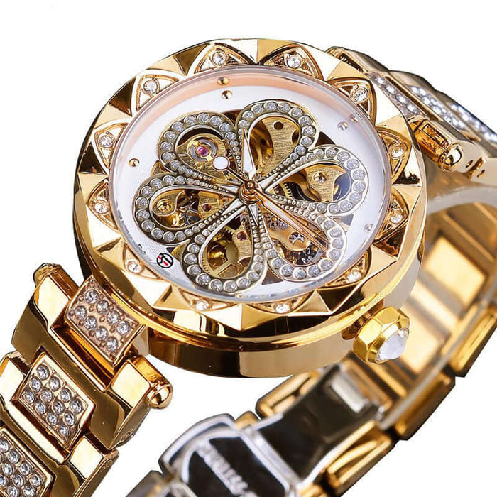 Forsining Mechanical Automatic Ladies Luxury Watch with gold design and sparkling embellishments.