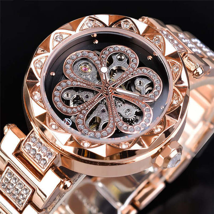 Forsining Mechanical Automatic Ladies Luxury Watch with sparkling design and intricate butterfly-shaped movement.