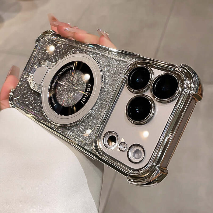 Hand holding a Four-Corner Airbag Drop-Proof Glitter Powder Phone Case featuring a shiny, sparkling design.