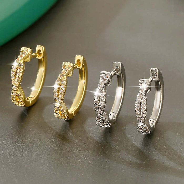 Geometric Braided Copper Hoops Luxury Gold Silver Earrings displayed in a stylish arrangement, showcasing gold and silver options.
