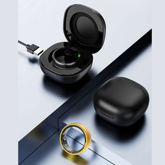 Healthy Heart Rate Blood Oxygen R6 Smart Ring displayed beside its charging case on a sleek surface.