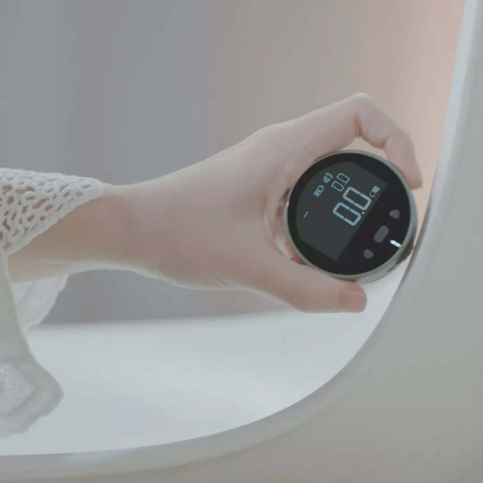 Hand holding a High-Precision Digital LCD Electronic Measuring Ruler showing digital readout.