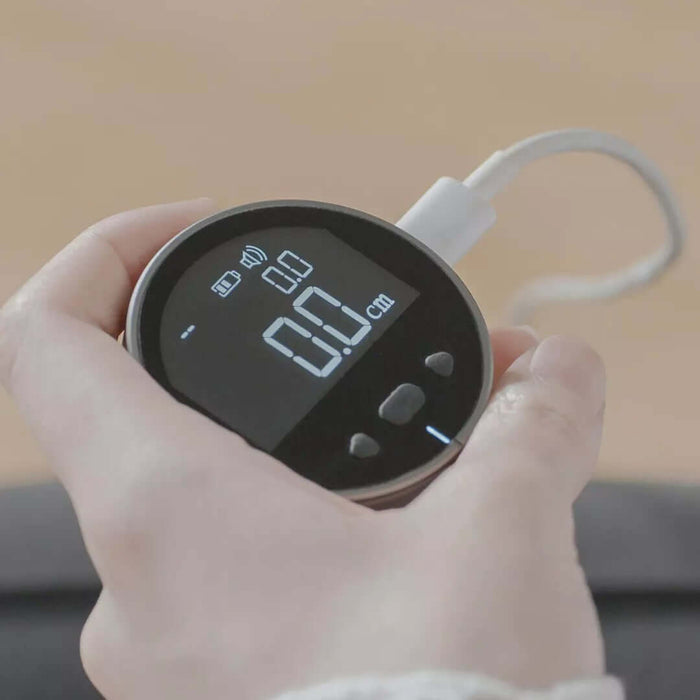 High-Precision Digital LCD Electronic Measuring Ruler in hand displaying measurement readings.