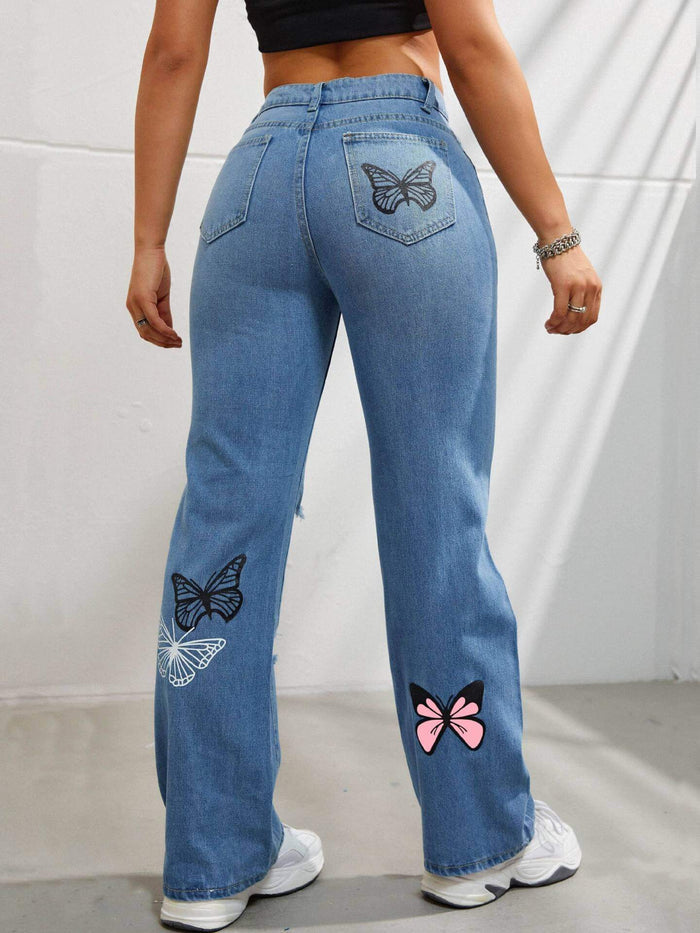 High Waisted Straight Leg Jeans For Women with butterfly designs on legs and back pockets, styled from the rear.