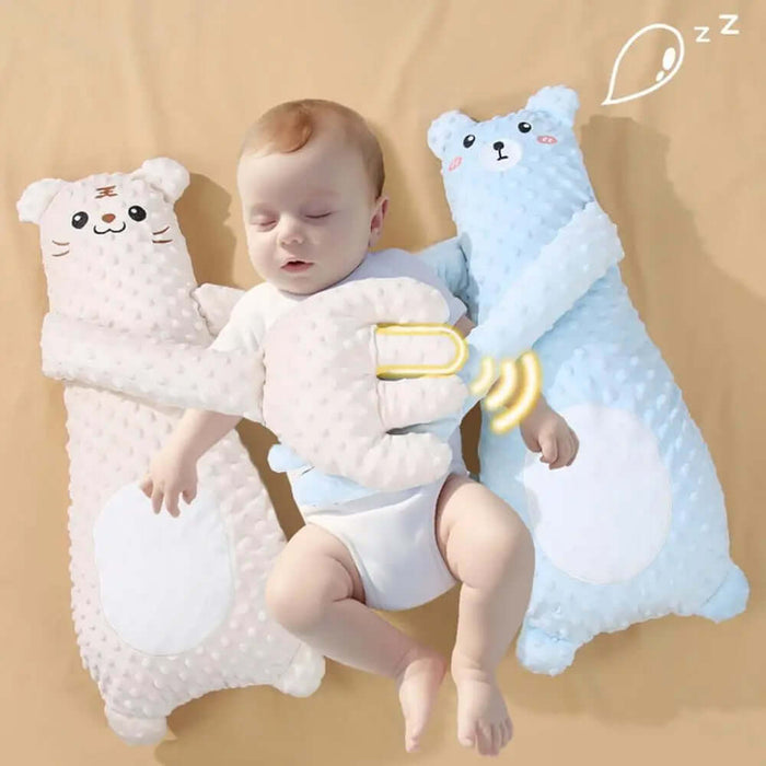 Infant Remote Controlled Cartoon Soothing Sleep Pillow next to a peacefully sleeping baby with plush animal design.