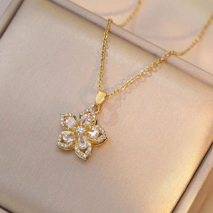 Ins Rhinestones Flowers Unique Rotatable Necklace Pendant with a golden flower-shaped pendant and sparkling rhinestones.
