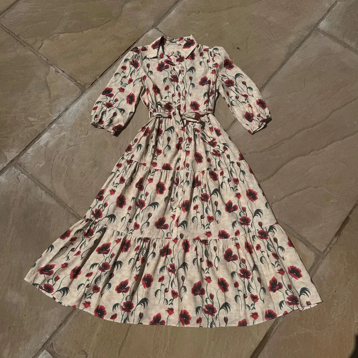 Floral dress on a stone floor