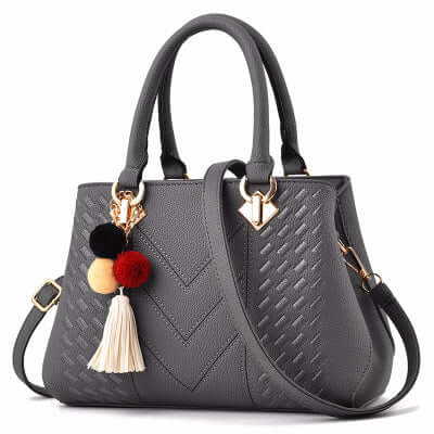 Ladies Luxury Crossbody Handbag zipper closure mechanism.