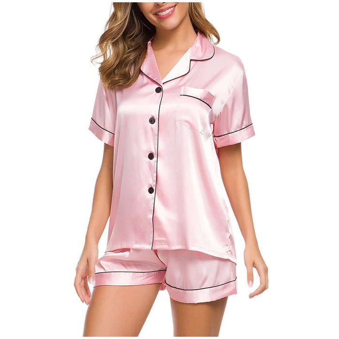 Ladies Short Sleeve Nightwear Casual Pajama Set in pink satin with black piping, featuring a button-up shirt and shorts.