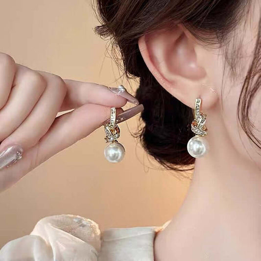Light Luxury Micro Inlaid Zircon Bow Chain Earrings gold plated copper.