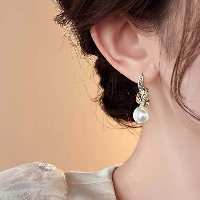Light Luxury Micro Inlaid Zircon Bow Chain Earrings micro inlaid zircon process.