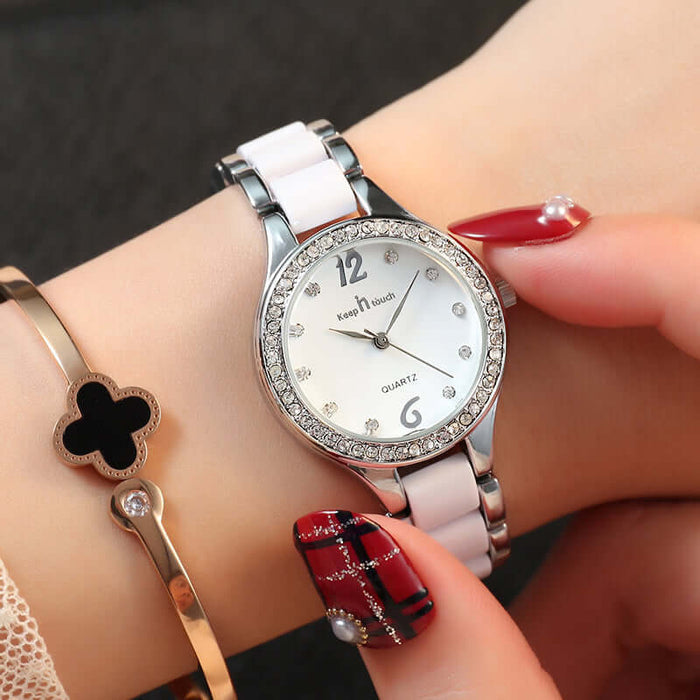 Luxury Women Quartz Watch Ceramic Diamond Ladies Gift on a wrist, showcasing its elegance and style.
