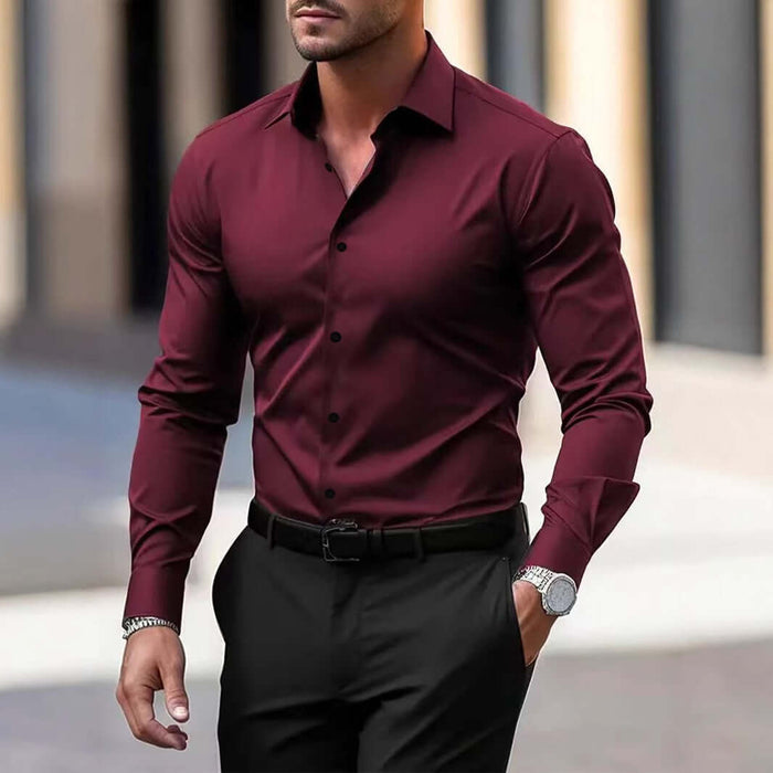 Mens Business Button Down Long Sleeve Vacation Shirt worn by a man in a maroon color, paired with black trousers.