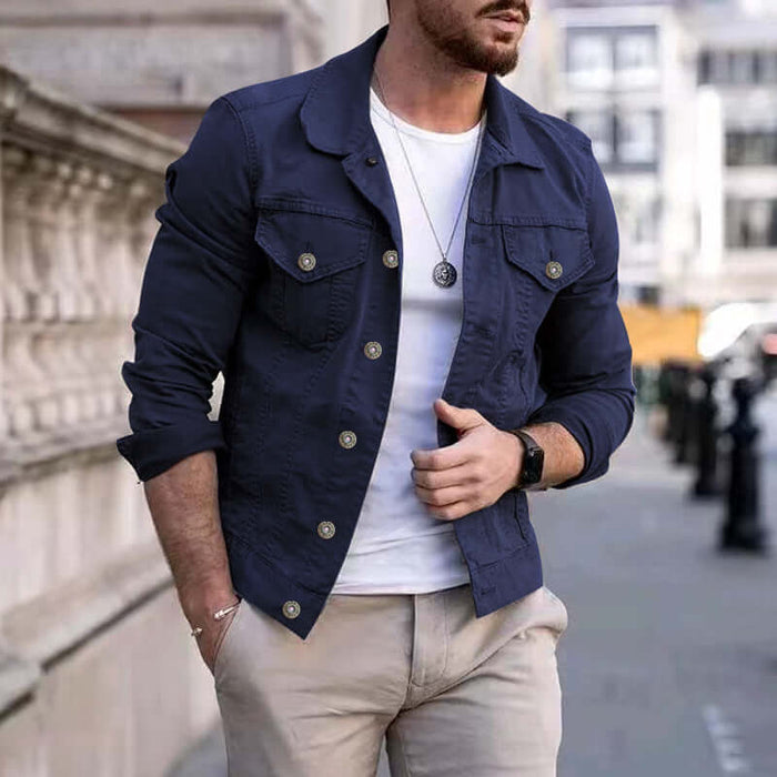 Mens Slim Fit Denim Lapel Jacket Casual Fashion worn by a man, styled with a white t-shirt and light pants outdoors.