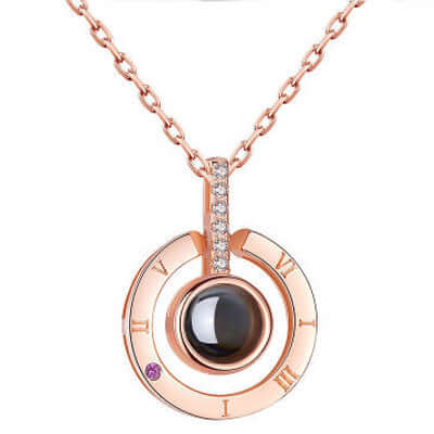 Metal Rose Jewelry Gift Box with Crystal Necklace featuring a stylish circular pendant design with gemstones.