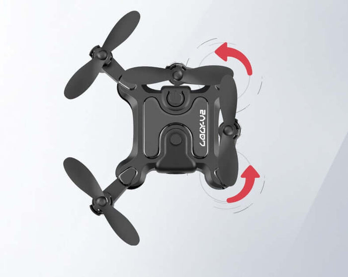 Mini Folding Drone 4K HD Aerial Photography UAV in flight showcasing its compact design and propellers.