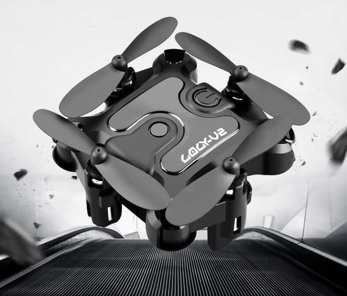 Mini Folding Drone 4K HD Aerial Photography UAV hovering against a sleek background with spinning propellers.