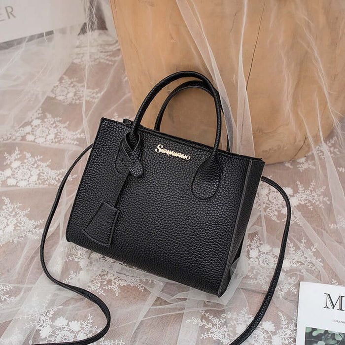 New Product Personality Messenger Phone Shoulder Bag in black, stylish design with textured surface and adjustable strap.
