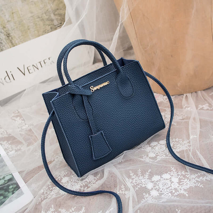 New Product Personality Messenger Phone Shoulder Bag in navy blue, stylish design with handles and adjustable strap.