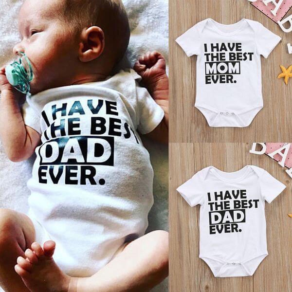 Newborn Cotton Summer Baby Romper Jumpsuit Set adorable unisex short sleeve baby clothes on cream boutique display hanger