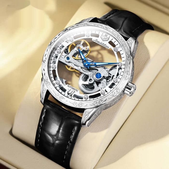 Openwork Mechanical Watch With Waterproof Leather Strap displayed on a cushioned surface, featuring a detailed transparent dial and black leather strap.
