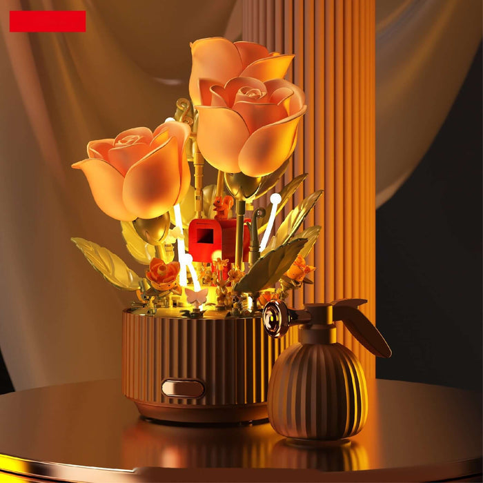 Preserved flower building blocks model with glowing roses and decorative elements on a stylish tabletop.