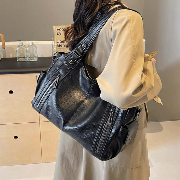 Retro Large Capacity Shoulder Bag brown PU leather texture.