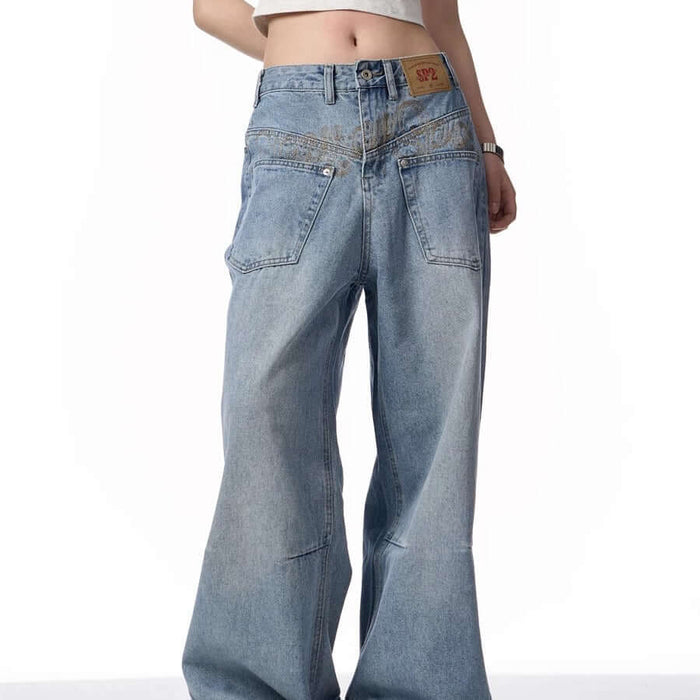 Retro Reverse-wear Washed Denim Jeans for Men in a slim fit, showcasing the light blue color and trendy style.