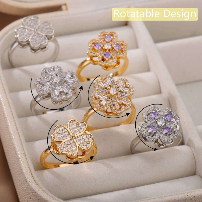 Rotatable Flower Ring Rhinestone Anti Anxiety Jewelry featuring a collection of floral designs in various metals.