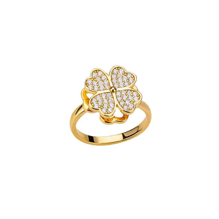 Rotatable Flower Ring Rhinestone Anti Anxiety Jewelry with a golden clover design and sparkling rhinestones