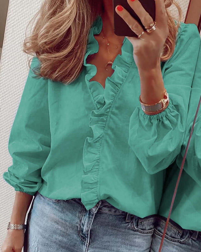 Ruffle Long Sleeve Blouse polyester fabric texture.