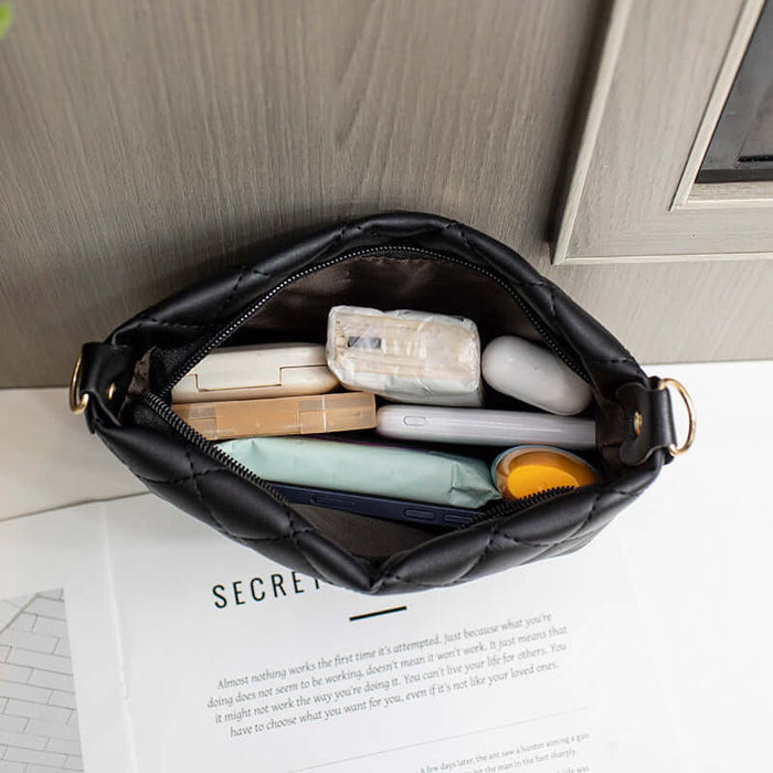 Small Messenger Bag Lingge Embroidery Shoulder Purse opened with contents inside, showcasing its stylish design and practicality.
