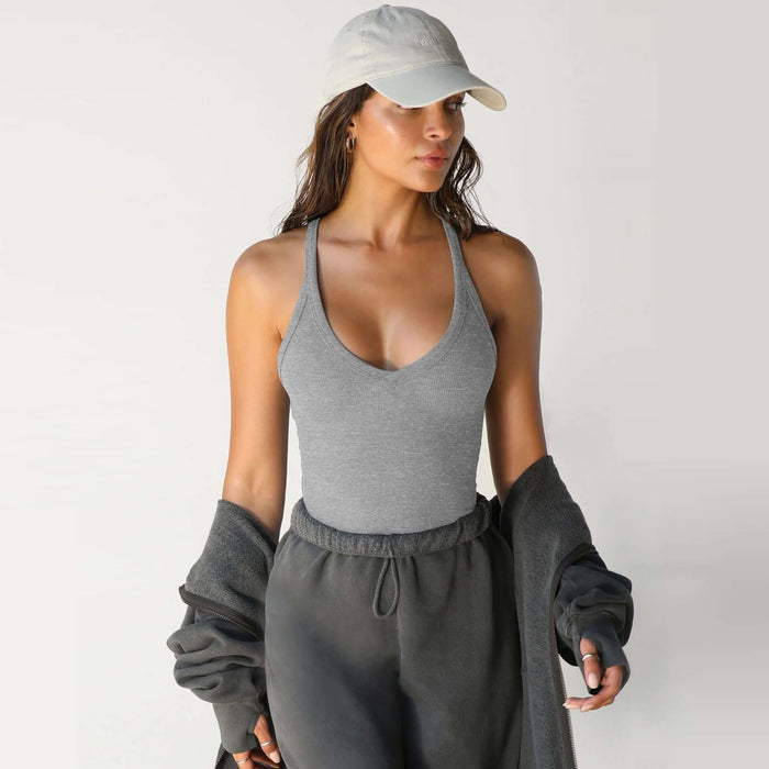 Spring Knitted Ribbed Vest Top solid monotone picture color apparel presentation highlighting soft aesthetics