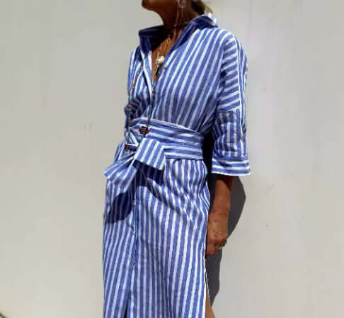 Striped Half-Sleeve Belted Lapel Shirt Dress worn by a model against a light background, showcasing its stylish design.