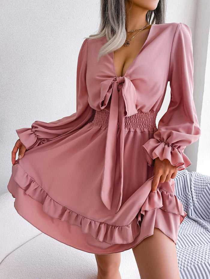 Summer Dresses Solid Color V-Neck Long Sleeve Dress soft pastel pink textile version outlining a romantic street fashion look.