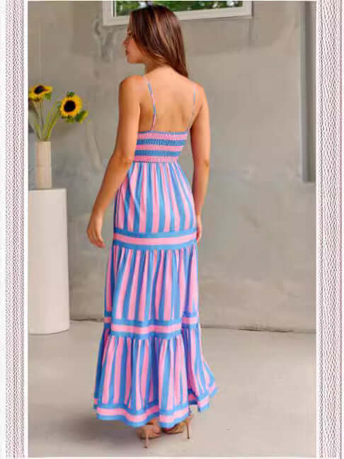 Back view of Summer Striped Suspender Long Beach Dress with Pockets in pink and blue stripes.