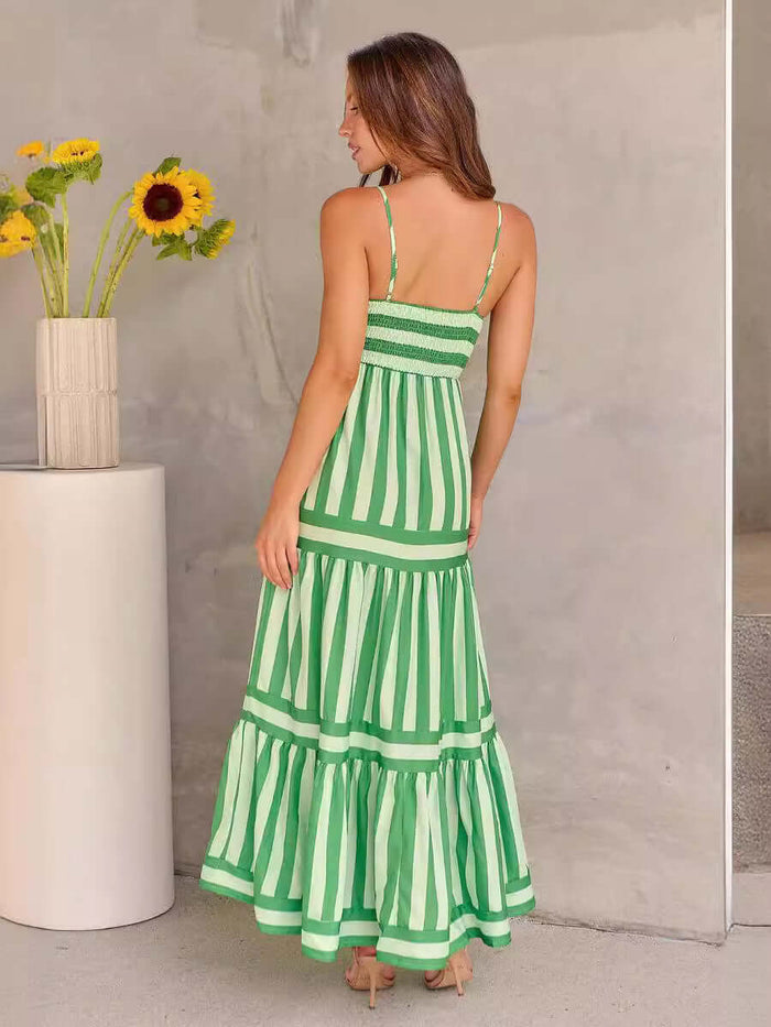 Summer Striped Suspender Long Beach Dress with Pockets in green and white stripes, featuring a flowy skirt and straps.